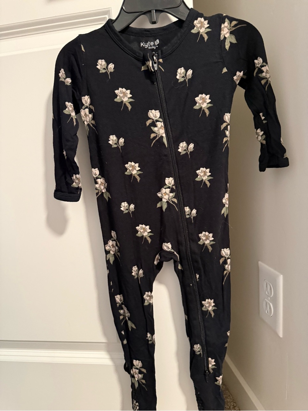 Kyte BABY Black One-Piece Footie with Cream Floral Print